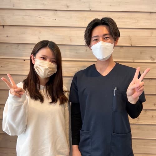 来院されたお客様とスタッフ